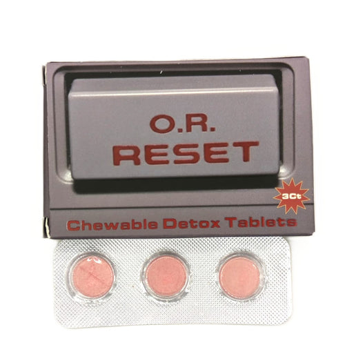 Pack of chewable detox tablets labeled 'O.R. Reset' with three tablets visible.