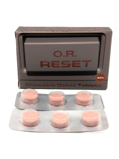 O.R. Reset chewable detox tablets packaging with pink tablets on a white background